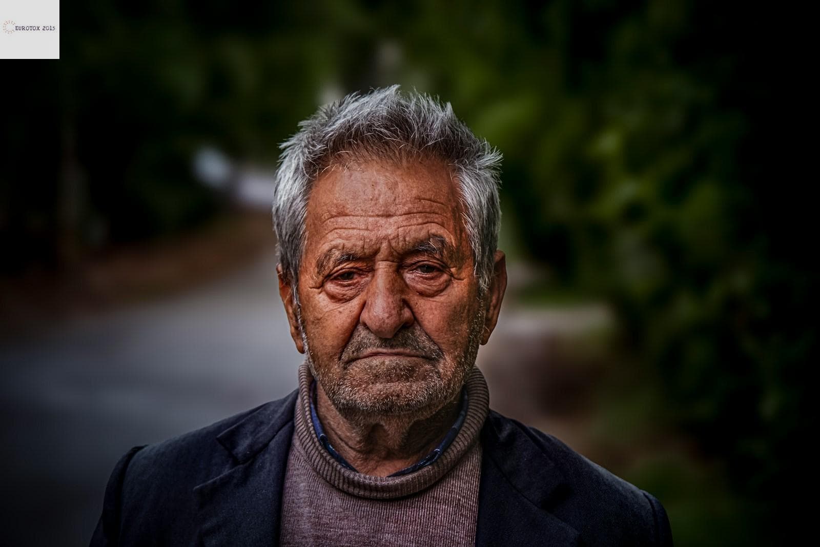 a man with a serious look on his face
