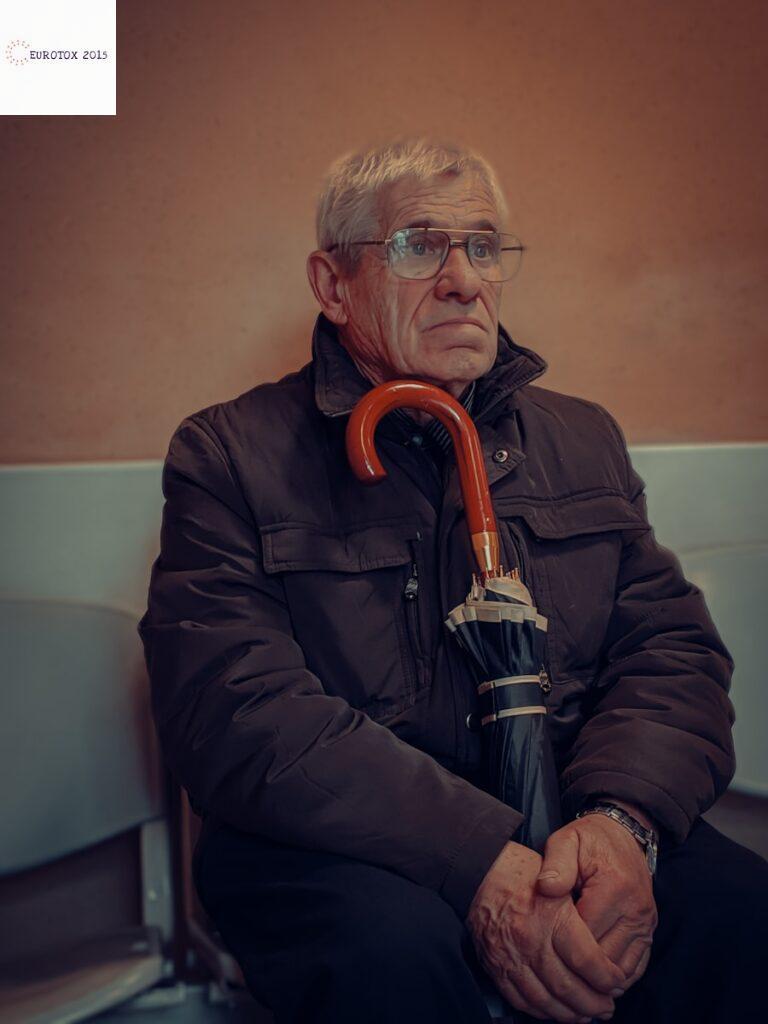 man in black jacket wearing eyeglasses